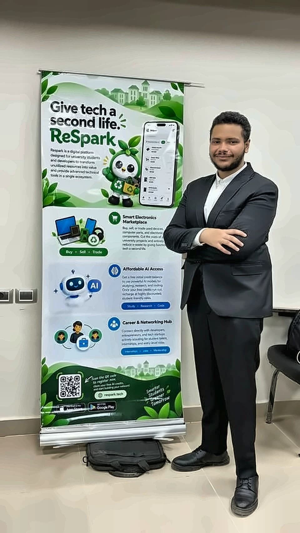 Standing next to the ReSpark roll-up banner at Green Loop